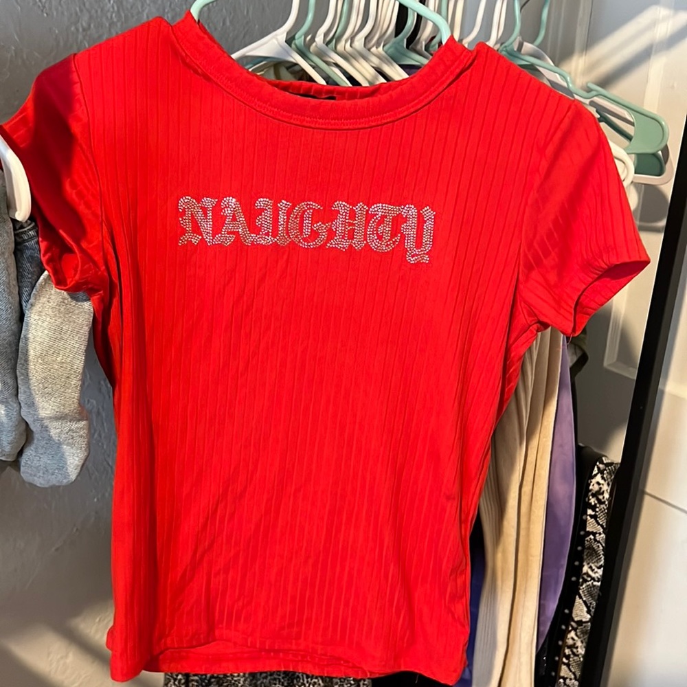 Red studded ‘NAUGHTY’ T